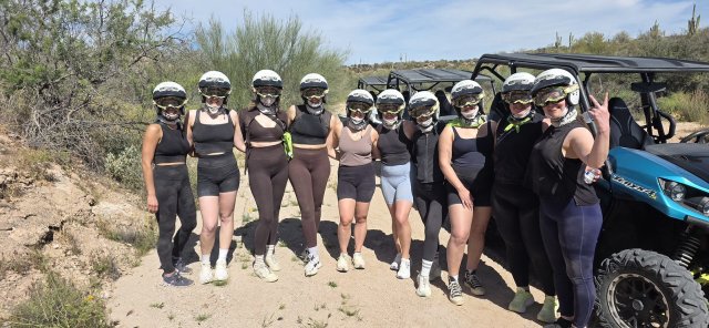 Your whole group, one trail - helmets on for a combo ATV and UTV tour