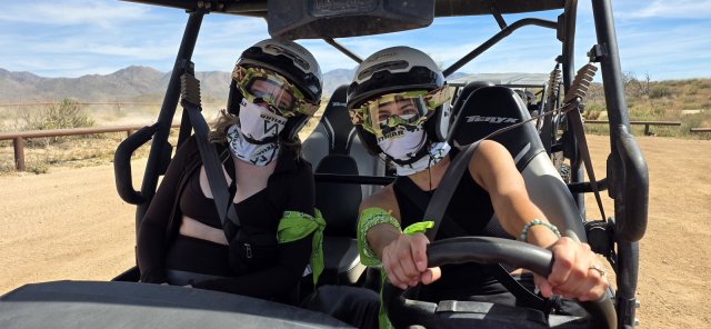 Driver and passenger in a 4-seat UTV on a 360 Adventures combo tour