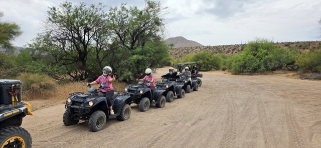 Single-rider ATVs lined up and ready at the 360 Adventures staging area