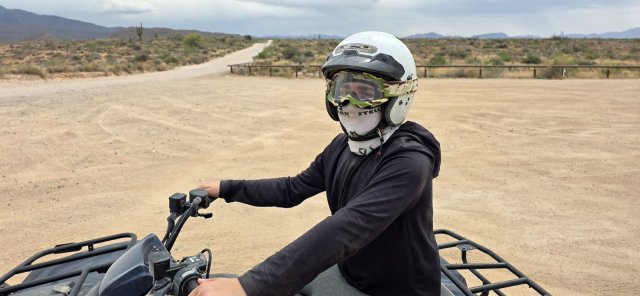 Solo rider piloting her own single-rider ATV on a 360 Adventures tour